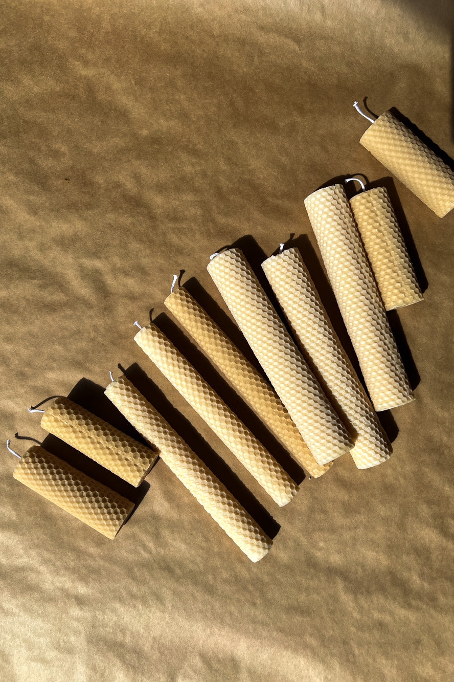Hand-rolled beeswax candles made in Perth, Western Australia — natural pillar candles with subtle honey scent, sustainable and eco-friendly home décor.