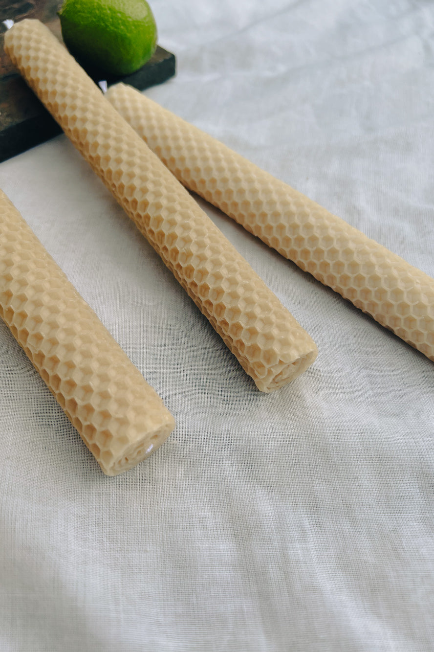 Hand-rolled beeswax candles made in Perth, Western Australia — natural taper candles with subtle honey scent, sustainable and eco-friendly home décor