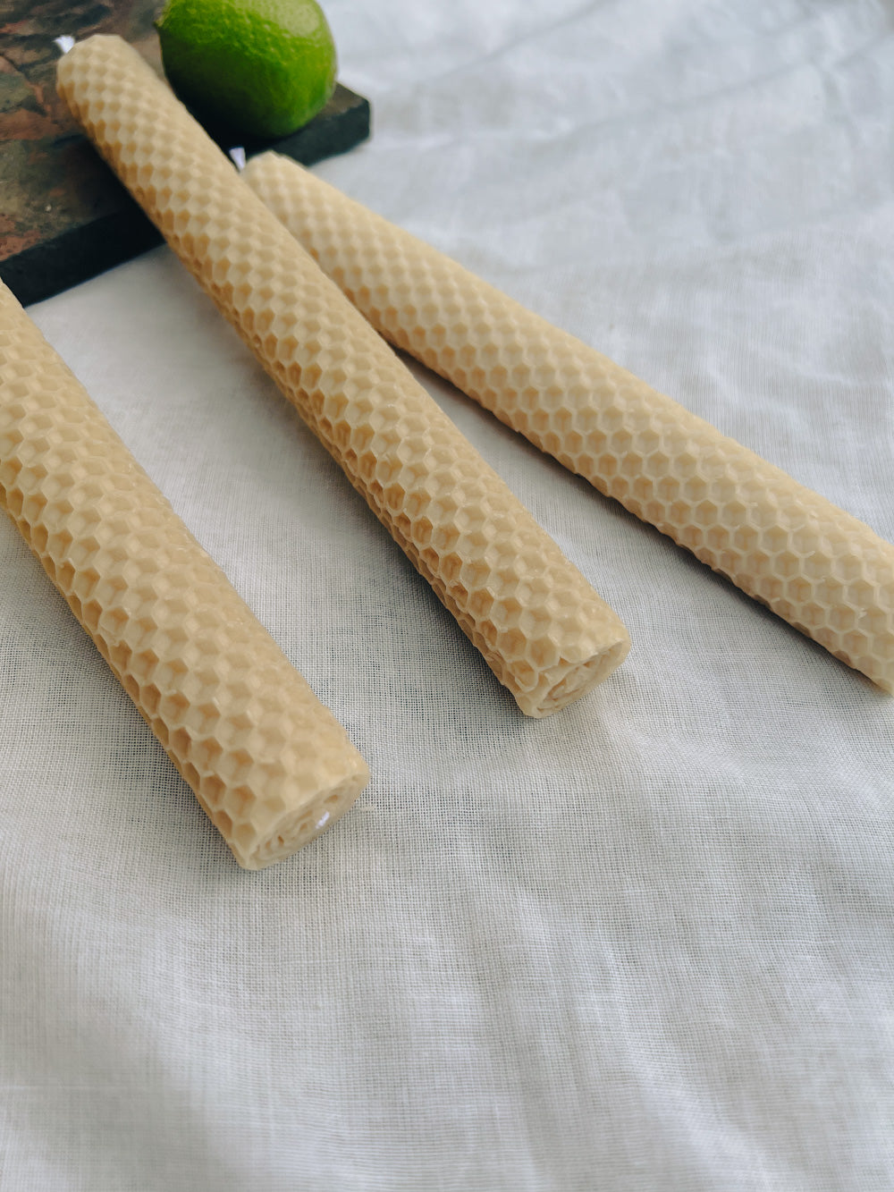 Hand-rolled beeswax candles made in Perth, Western Australia — natural taper candles with subtle honey scent, sustainable and eco-friendly home décor
