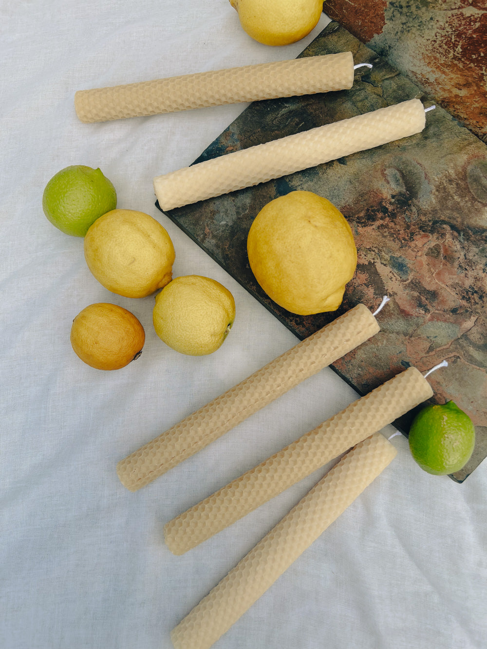 Hand-rolled beeswax candles made in Perth, Western Australia — natural taper candles with subtle honey scent, sustainable and eco-friendly home décor