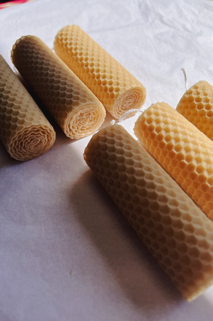 Hand-rolled beeswax candles made in Perth, Western Australia — natural pillar candles with subtle honey scent, sustainable and eco-friendly home décor.