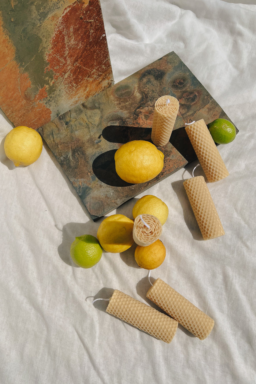 Hand-rolled beeswax candles made in Perth, Western Australia — natural pillar candles with subtle honey scent, sustainable and eco-friendly home décor.