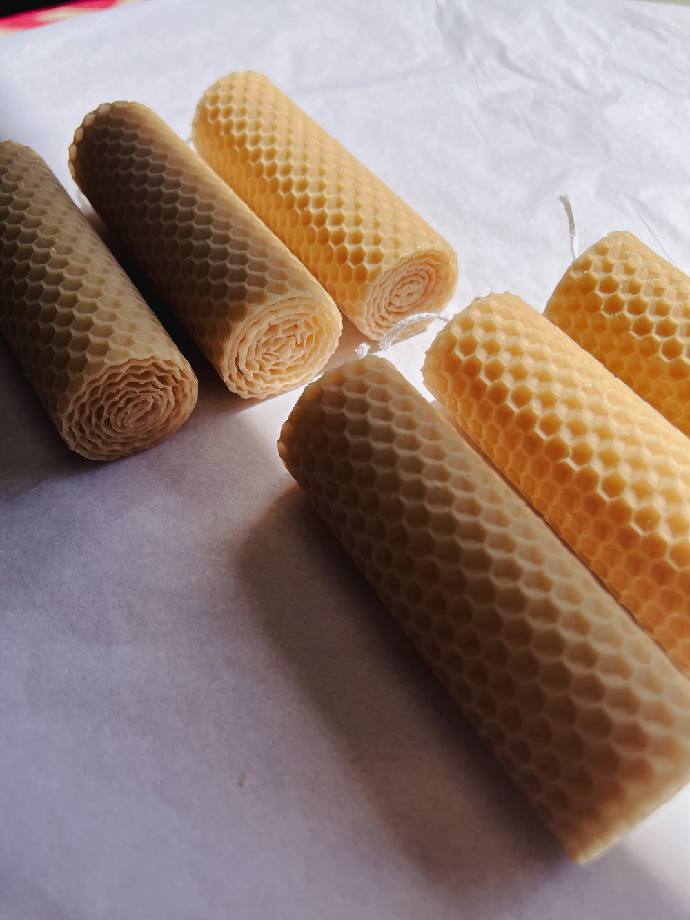 Hand-rolled beeswax candles made in Perth, Western Australia — natural pillar candles with subtle honey scent, sustainable and eco-friendly home décor.