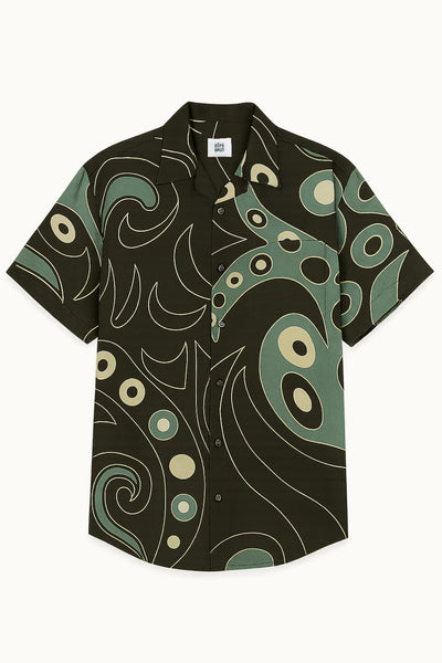 Short-sleeve handpainted cotton shirt with a green and brown abstract pattern on a white background