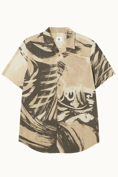 Hand-painted batik shirt made from organic cotton, featuring a leaf-inspired pattern