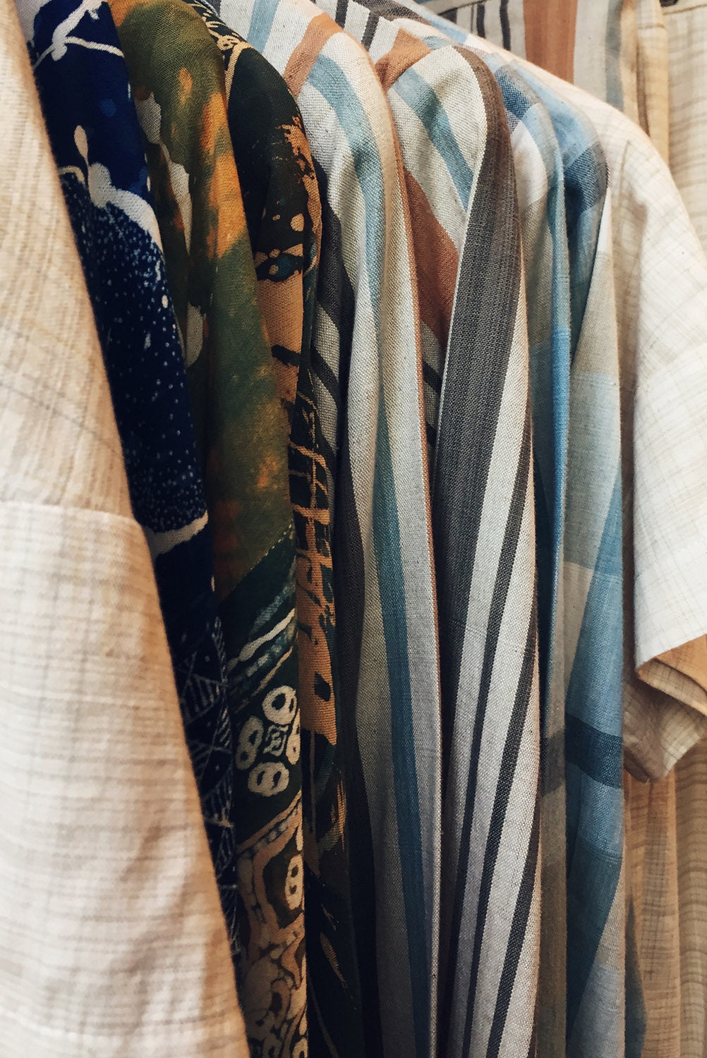 A small group of garments with consistent silhouettes and cohesive tones, illustrating seasonless design focused on durability, structural restraint, and long-term wear rather than trend cycles.