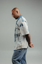 handpainted cotton batik shirt with natural and indigo strokes photographed from the side